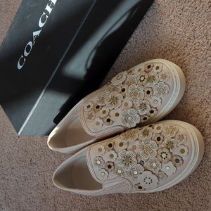 Coach cream leather slip on sneakers